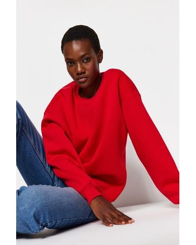 Trendyol Es oversize/bequem geschnittenes basic-rundhals-sweatshirt aus dickem fleece mit innenfutter - Rot