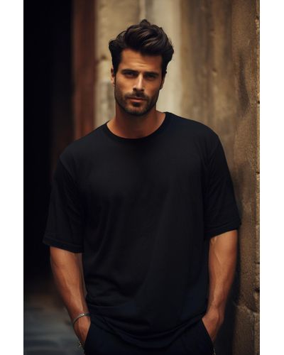 Trendyol Es, übergroßes/weit geschnittenes, kurzärmliges basic-t-shirt mit rundhalsausschnitt - Schwarz