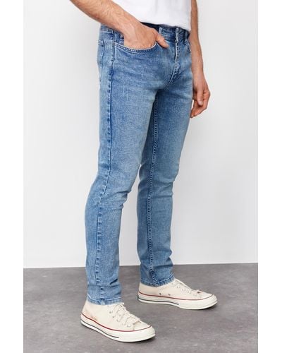 Trendyol Blaue skinny fit rake destroyed jeans jeans
