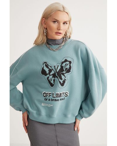 Grimelange Racket sweatshirt mit rundhalsausschnitt, fleece-innenpaspelierung und bedrucktem stück in - Blau