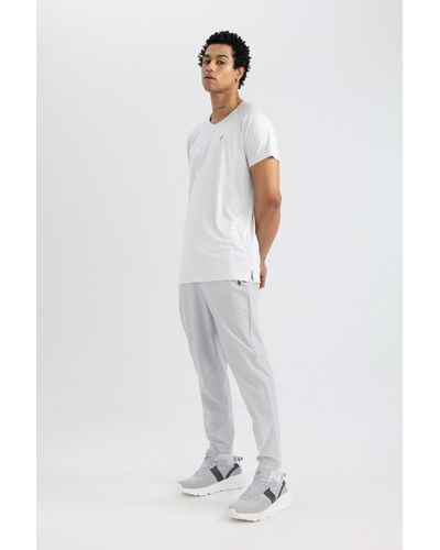 Defacto Fit slim fit, zwei taschen, standardbein, gewebte jogginghose, - Weiß