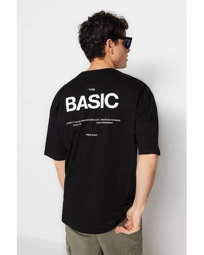 Trendyol Es, übergroßes/weit geschnittenes, kurzärmliges t-shirt aus 100 % baumwolle mit textdruck - l - Schwarz