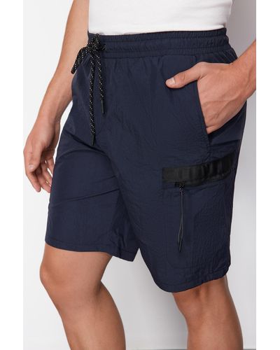 Trendyol Marineblaue shorts mit reißverschluss und detailliertem design in normaler passform