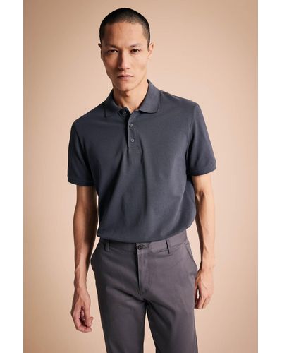 Defacto Poloshirt mit normaler passform aus 100 % baumwolle - Blau