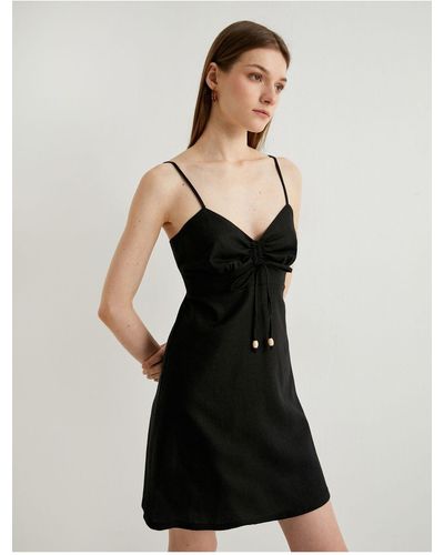 Koton Minikleid aus leinen – dünne träger, drapiert und mit perlen besetzt - Schwarz
