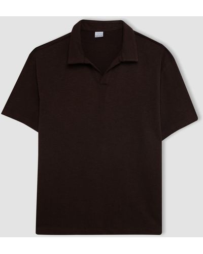 Defacto Kurzärmliges polo-t-shirt mit entspannter passform - Schwarz