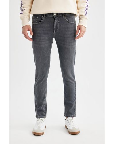 Defacto Carlo skinny fit extra skinny fit jeanshose mit normaler taille und extra schmalem bein a2140ax24sp - Blau