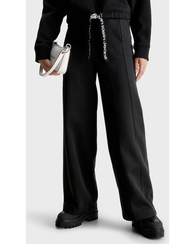 Calvin Klein Jogginghose aus gewebtem stoff mit hoher taille und bequemer alltags-jogginghose in -beh - Schwarz