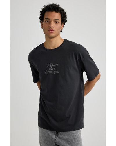 Defacto Bedrucktes oversize-t-shirt mit rundhalsausschnitt – kurzarm b3783ax23hs - Schwarz