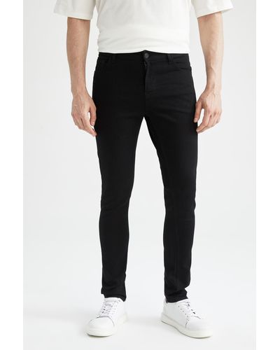 Defacto Superdünne, extra enge jeanshose mit normaler taille und extra schmalem bein - Schwarz