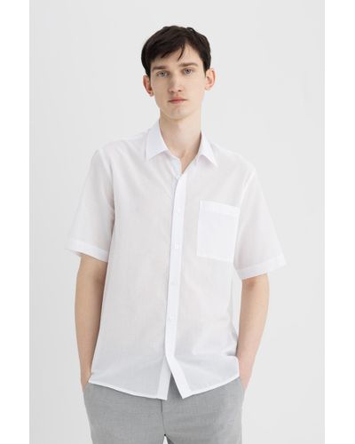 Defacto Kurzarmhemd aus baumwolle mit polokragen und relax fit - Weiß