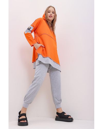 Trend Alaçatı Stili Doppelset aus mehrlagigem kapuzenpullover und jogginghose in - Orange