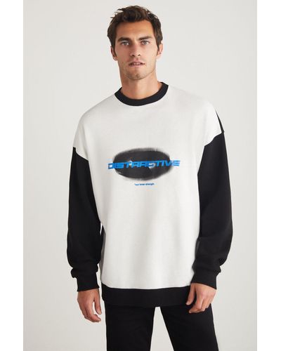 Grimelange Hanion sweatshirt aus 100 % baumwolle, rundhalsausschnitt, oversize-passform, -weiß, mit druckdetail
