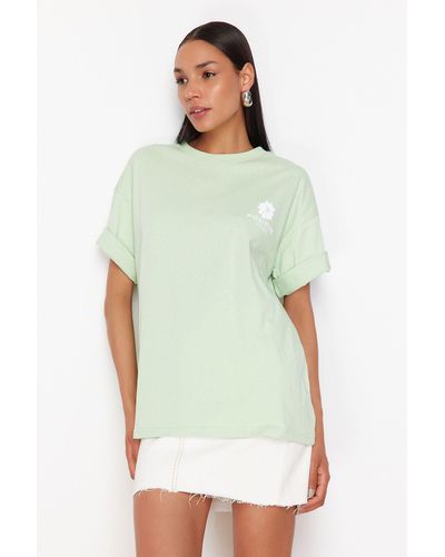 Trendyol Mintfarbenes, bedrucktes oversize-/weitform-strick-t-shirt mit rundhalsausschnitt und rückenteil - Grün