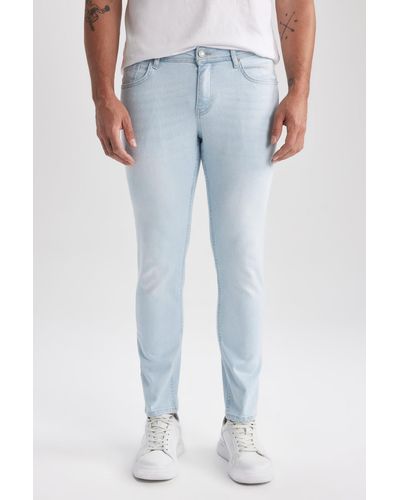Defacto Carlo skinny fit extra skinny fit jeanshose mit normaler taille und extra schmalem bein a2873ax23sm - Blau