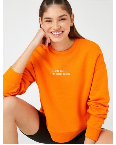 Koton Oversize-sweatshirt mit slogan-aufdruck, gerippter rundhalsausschnitt, lange ärmel - Orange