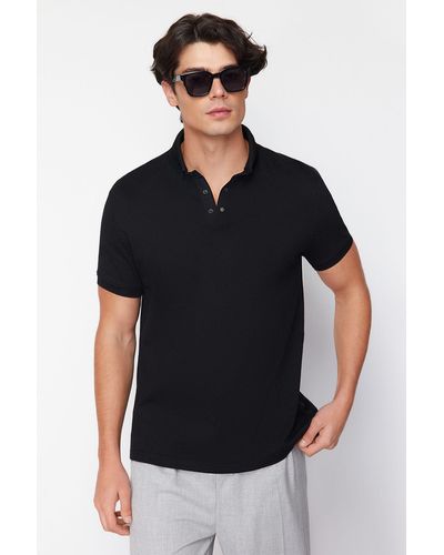 Trendyol Es t-shirt mit polokragen im regulären/normalen schnitt - Schwarz