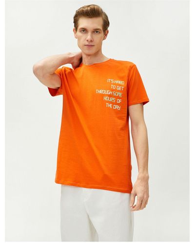 Koton Kurzarm-t-shirt aus baumwolle mit rundhalsausschnitt und slogan-print - Orange