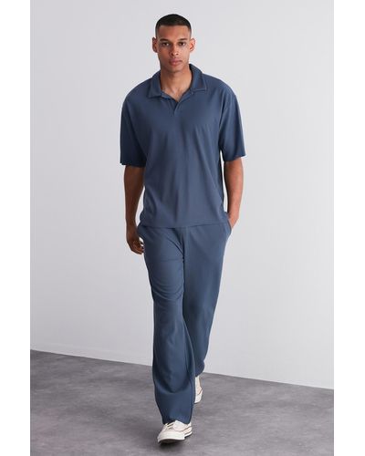 Trendyol Limited edition indigo bequeme jogginghose mit strukturierter, versteckter spitze und weitem bein - Blau