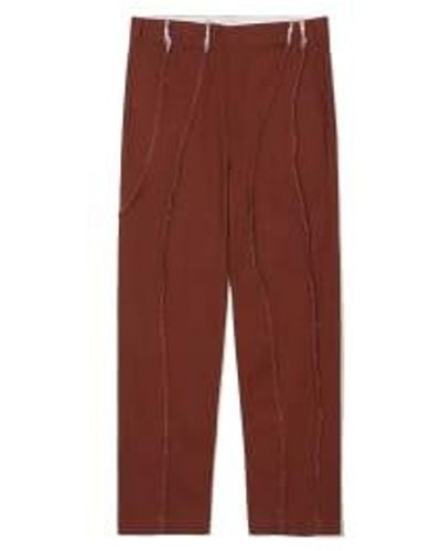 PARTIMENTO Curved Cut Off Chino Pants In Burnt - Rosso