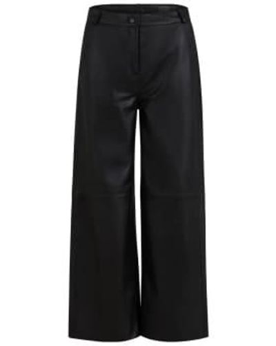 COSTER COPENHAGEN Pantalon en cuir longueur cheville noir
