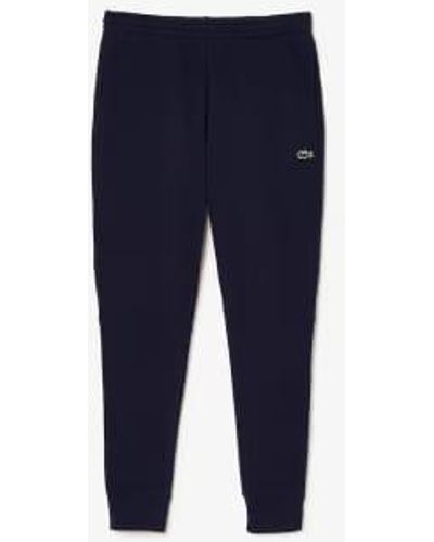 Lacoste Pantalones chándal estilo jogger corte slim en polar algodón orgánico hombre - Azul