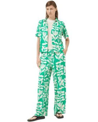 Compañía Fantástica Pantalon large imprimé vert de