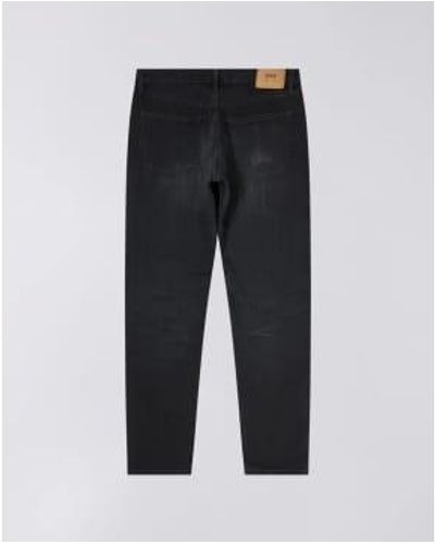 Edwin Jeans estiramientos negros con negros negros cónicos regulares