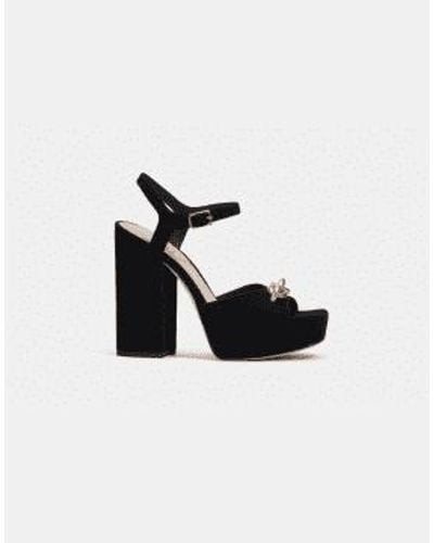 COACH Nicolette sue buckle detalle platform heels tamaño: 7, col: negro