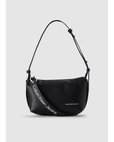 Calvin Klein Womens Sculpted Crossbody Bag With Logo Tag In Black - Nero