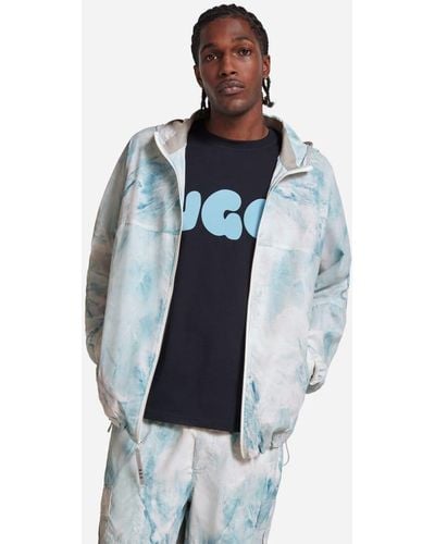 UGG Bedruckte, verstaubare ® Rixen Jacke - Blau
