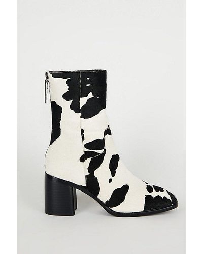 INTENTIONALLY ______ Pg Cow Print Boot - Black
