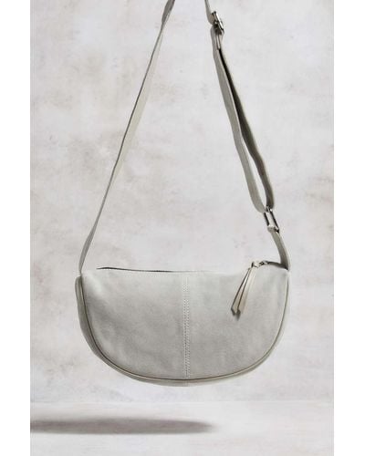 Urban Outfitters Uo Suede Contrast Stitch Sling Bag - White