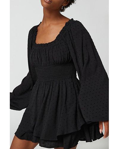 Urban Outfitters Uo Clip Dot Smocked Long Sleeve Romper - Black