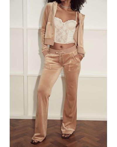 Juicy Couture Uo Exclusive Sand Low-rise Velour Flare Track Trousers - Natural