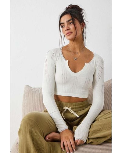 Urban Outfitters Uo Go For Gold Pointelle Notched Long-sleeved Crop Top - White