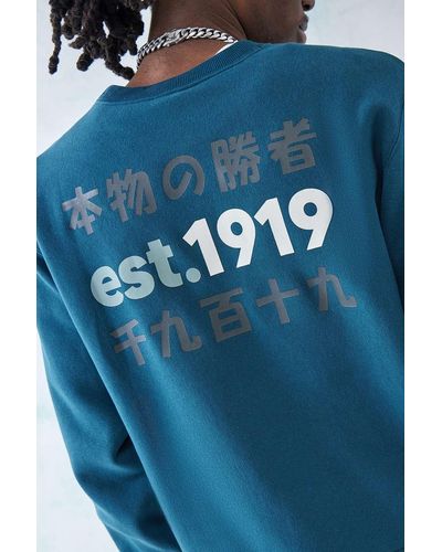 Champion Uo exclusive - sweatshirt in marine mit japanischen schriftzeichen - Blau