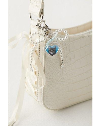 Urban Outfitters Pearl Bow Locket Keychain - Natural