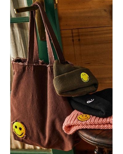 Urban Outfitters Uo Smile Patch Distressed Canvas Tote Bag - Brown