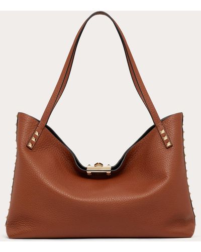 Valentino Garavani Medium Rockstud Grainy Calfskin Bag With Contrasting Lining - Brown