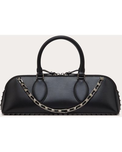 Rockstud E/w Calfskin Handbag for Woman in Rouge Pur
