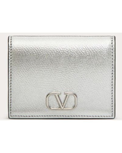 Valentino Garavani Vlogo Signature Metallic Grainy Calfskin Compact Wallet - Natural