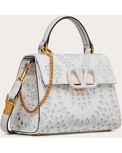 Valentino Garavani Small Vsling Handbag In Calfskin With San Gallo Embroidery - White