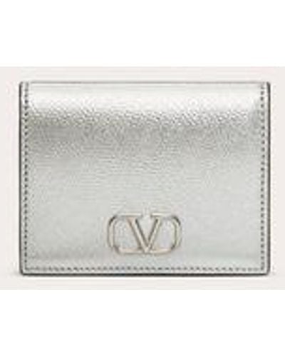 Valentino Garavani Vlogo Signature Metallic Grainy Calfskin Compact Wallet - Natural