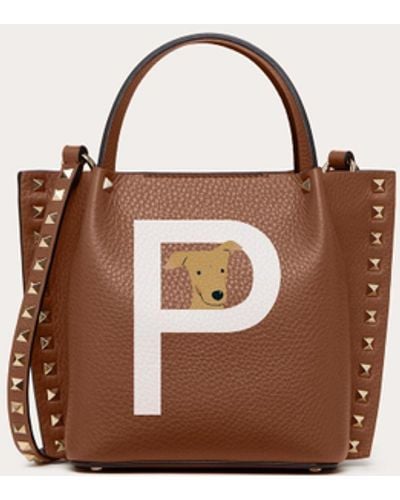 Rockstud Grainy Calfskin Tote Bag for Woman in Saddle Brown