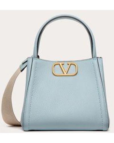 Valentino Garavani BOLSO DE MANO PEQUEÑO ALLTIME DE CUERO DE BECERRO GRANULADO - Azul