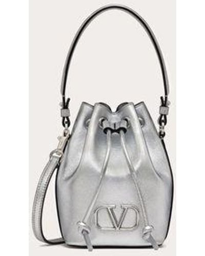 Valentino Garavani Mini Vlogo Signature Bucket Bag In Metallic Nappa Leather - Natural