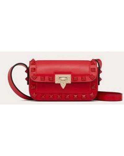 Valentino Garavani Borsa micro a tracolla rockstud23 in vitello liscio - Rosso