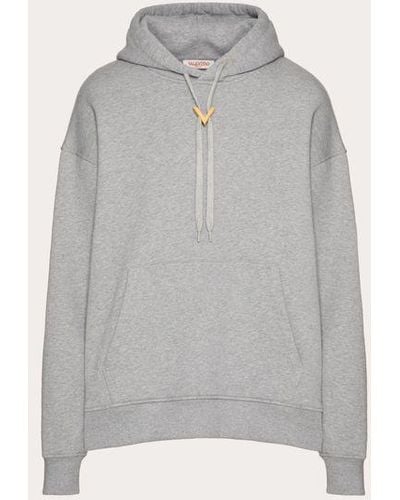 Valentino SWEAT À CAPUCHE EN COTON AVEC ÉLÉMENT V EN MÉTAL - Gris