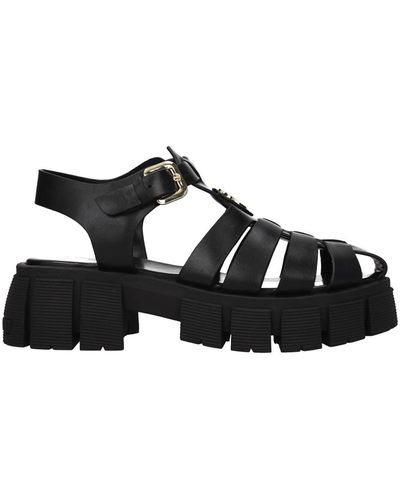 Love moschino hot sale platform sandals